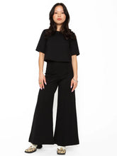 Load image into Gallery viewer, High-waist, wide leg pant in Ponte knit, cropped for petite ladies or those wanting to flaunt flats or heels. Slimming, elongating silhouette for all body types.