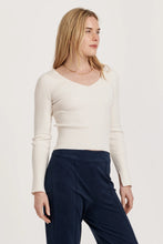Load image into Gallery viewer, Versatile long sleeve V-neck top in solid knit, showcasing a soft ribbed finish and edge hem, perfect for any occasion.