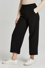 Load image into Gallery viewer, Cropped wide leg pants made from soft, stretchy fabric. Introducing Denali Pant Black from Another Love. High rise, flattering silhouette, perfect for any occasion.