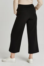 Load image into Gallery viewer, Introducing the Denali Pant Black from Another Love. Soft, stretchy cropped wide leg pants made of 97% polyester and 3% spandex. Flattering silhouette with a comfortable fit.