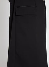 Load image into Gallery viewer, The black Denver Ponte Sleeveless Coat worn over a white shirt and black pants by Lysse.
