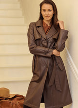 Load image into Gallery viewer, Knee-length Cielo Vegan Leather Trench Coat featuring a double-breasted front, self-tie belt, and functional pockets.
