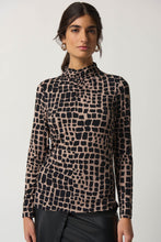 Load image into Gallery viewer, Animal print jersey top with long sleeves, fitted silhouette, and mock neck. Perfect for dressing up with trousers and heels or keeping casual with jeans and sneakers.
