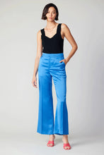 Load image into Gallery viewer, Elevate your style with these opulent wide-leg pants. With a high waist and loose fit, they add a touch of vibrancy and boldness to your ensemble. Featuring a sleek waistband and impeccable creasing, these pants are the epitome of elegance.
