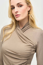 Load image into Gallery viewer, Luxurious jersey knit top with a wrap neckline and long sleeves, showcasing delicate shirring for a chic day-to-night look.
