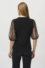 Load image into Gallery viewer, Luxurious silky knit top with puffed mesh sleeves and pearl accents, perfect for enchanting date nights or sophisticated events.
