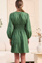 Load image into Gallery viewer, Green dress worn by a person in a living room setting
