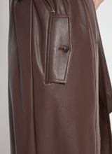 Load image into Gallery viewer, Cielo Vegan Leather Trench Coat: knee-length, double-breasted, rainproof, with a self-tie belt and functional pockets for versatility.
