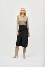 Load image into Gallery viewer, Understated glamour in a jersey knit top with a wrap neckline, long sleeves, and side shirring, ideal for transitioning from day to night.
