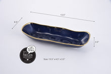 Load image into Gallery viewer, Sunset By The Sea. Ideal for bread, asparagus, crackers, or cookies. Blue glazed porcelain, gold-tone rims. Food, dishwasher, and oven safe (up to 500°). Tarnish and stain-resistant. Easy to maintain.

