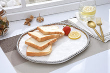 Load image into Gallery viewer, Salerno round serving platter with silver beads. Ideal for sweet treats, hors d’oeuvres, sandwiches, or pastries. Food, dishwasher, and oven safe up to 500°.

