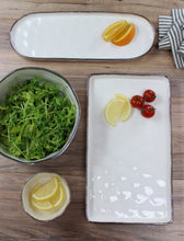 Load image into Gallery viewer, Oval tray from Bianca Collection: perfect for serving baguette, mushrooms, fruit, asparagus, carrots, green beans. White porcelain with silver rim. Food, dishwasher, oven safe.
