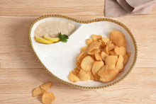 Load image into Gallery viewer, Two-section serving piece in Golden Salerno: perfect for crudités and dressing, chips and dip, or berries and cream. High-fired white porcelain with gold beads in titanium. Food, dishwasher, and oven safe. Tarnish and stain-free. Easy to care for.
