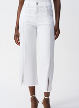 Load image into Gallery viewer, Chic culotte jeans featuring four practical pockets, embellished front seam, and trendy frayed hem for a fashionable edge.

