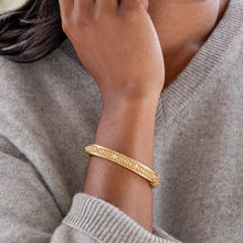Load image into Gallery viewer, A beautifully designed gold bangle with floral and leaf motifs, identified as the Berry Vine Hinged Bangle in S/M size.
