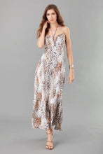 Load image into Gallery viewer, Lola &amp; Sophie Printed Key-Hole Maxi Dress features eye-catching animal print and daring key hole detail for a bold look.
