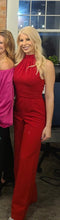 Load image into Gallery viewer, Stylish halter jumpsuit in fiery red, perfect for a posh couture look.
