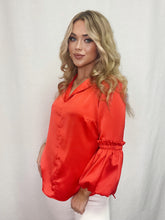 Load image into Gallery viewer, Luxurious Tangerine Puff Sleeve top in vibrant color made from Posh Couture fabric. Elegant and fashion-forward for special occasions.
