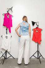 Load image into Gallery viewer, Elegant sky blue blouse with a beautiful neck wrap, designed by Posh Couture. Perfect for adding sophistication and class to any outfit.
