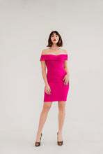 Load image into Gallery viewer, Stand out in the Posh Couture Kari Dress! Hot pink with off-the-shoulder cross detail, exuding sophistication and sultriness.
